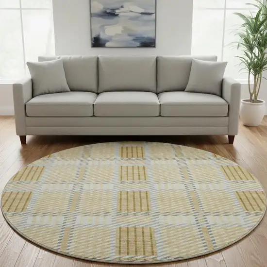 8' Gold Beige And Brown Plaid Washable Round Rug With UV Protection Photo 2