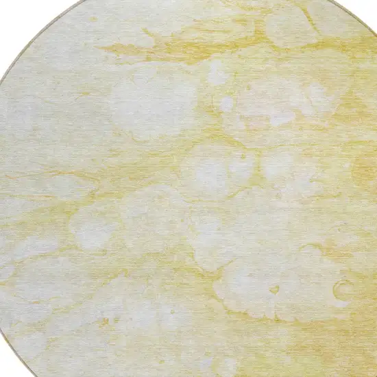 8' Gold Beige And Ivory Round Abstract Washable Indoor Outdoor Area Rug Photo 4