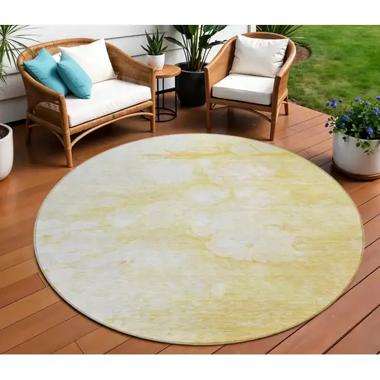 8' Gold Beige And Ivory Round Abstract Washable Indoor Outdoor Area Rug Photo 1