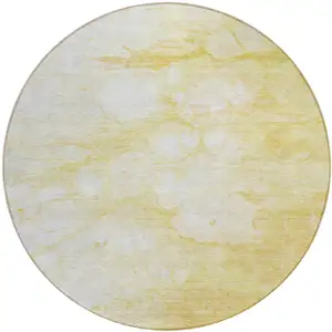 Photo of 8' Gold Beige And Ivory Round Abstract Washable Indoor Outdoor Area Rug