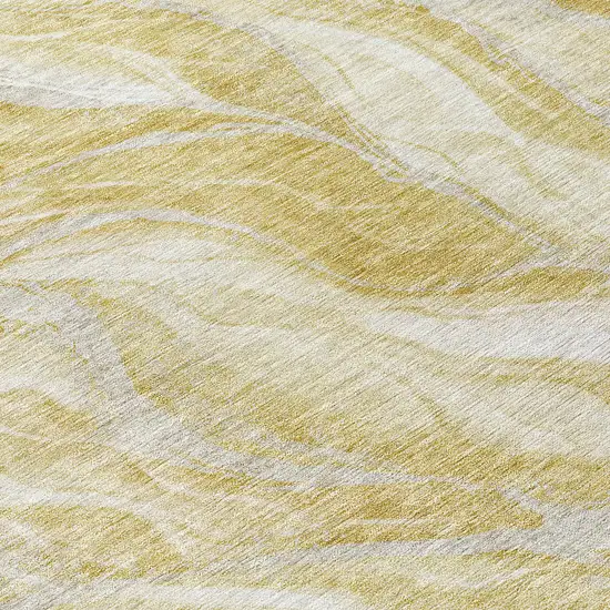 8' Gold Beige And Ivory Round Abstract Washable Indoor Outdoor Area Rug Photo 9