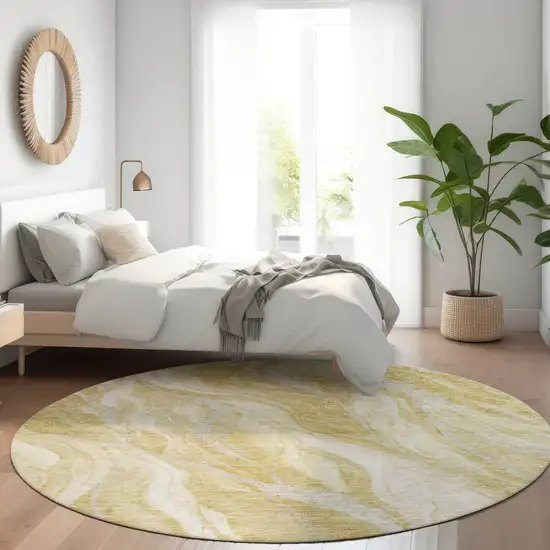 8' Gold Beige And Ivory Round Abstract Washable Indoor Outdoor Area Rug Photo 7