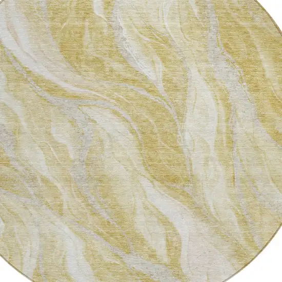 8' Gold Beige And Ivory Round Abstract Washable Indoor Outdoor Area Rug Photo 4