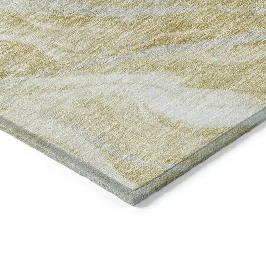 8' Gold Beige And Ivory Round Abstract Washable Indoor Outdoor Area Rug Photo 3
