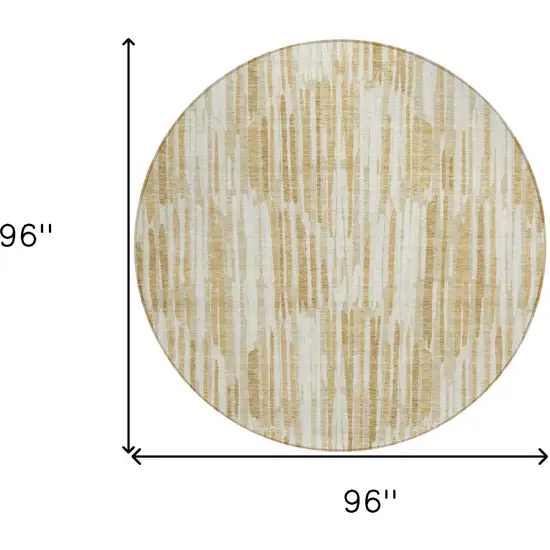 8' Gold Beige And Ivory Round Abstract Washable Indoor Outdoor Area Rug Photo 3