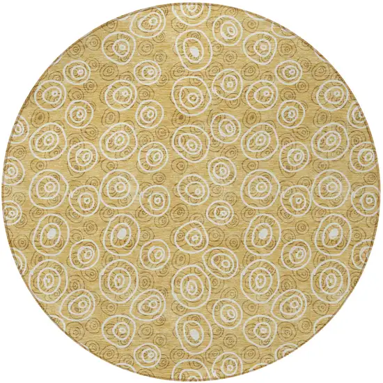 8' Gold Beige And Ivory Round Geometric Washable Indoor Outdoor Area Rug Photo 6