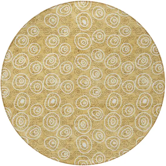 8' Gold Beige And Ivory Round Geometric Washable Indoor Outdoor Area Rug Photo 6