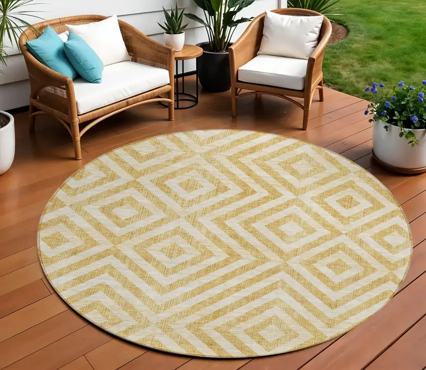 8' Gold Beige And Ivory Round Geometric Washable Indoor Outdoor Area Rug Photo 1
