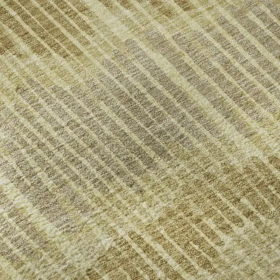 8' Gold Beige And Rust Striped Washable Round Rug With UV Protection Photo 9