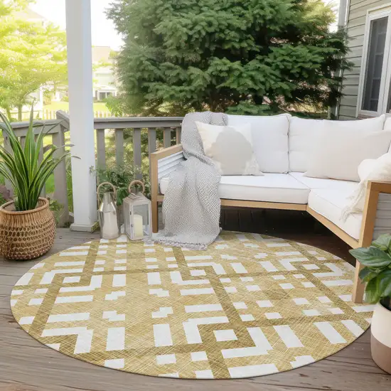 8' Gold Beige And Tan Round Geometric Washable Indoor Outdoor Area Rug Photo 6