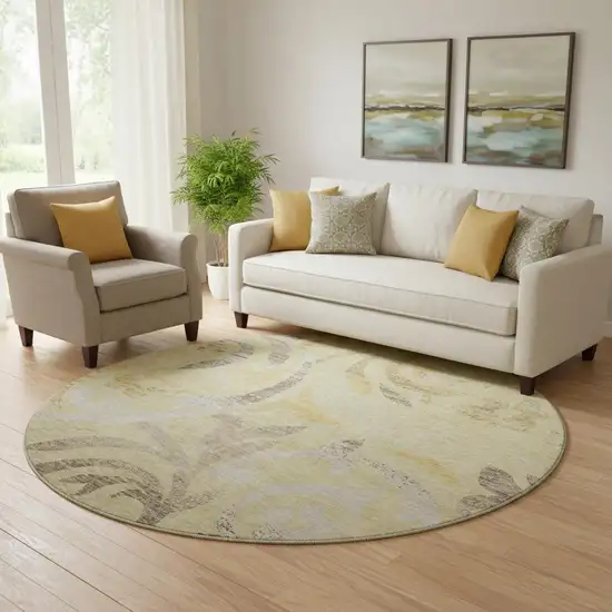 8' Gold Beige And Taupe Floral Washable Round Rug With UV Protection Photo 1