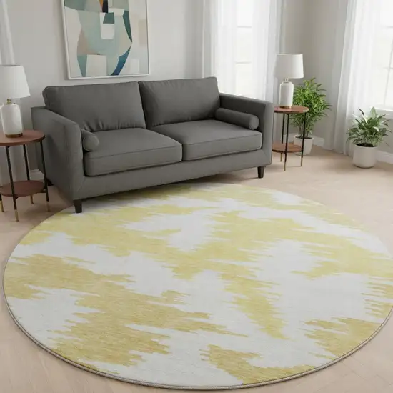 8' Gold Beige And Wheat Abstract Washable Round Rug With UV Protection Photo 2