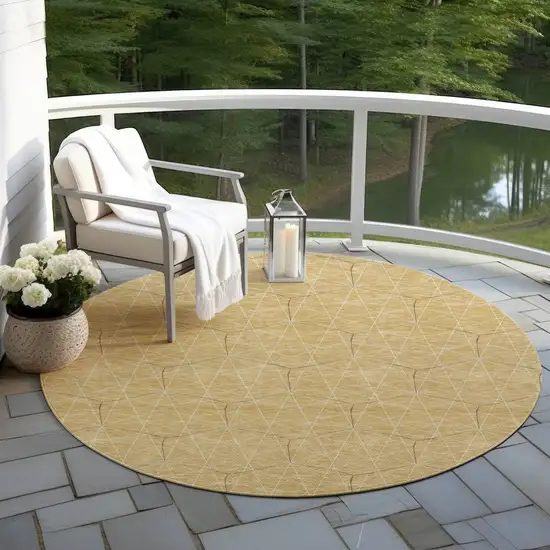 8' Gold Black And Beige Round Geometric Washable Indoor Outdoor Area Rug Photo 6