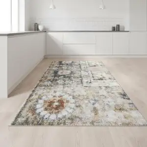 Photo of 8' Gold Black And Gray Floral Distressed Runner Rug