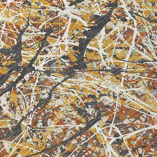 8' Gold Black And Ivory Round Abstract Washable Indoor Outdoor Area Rug Photo 9