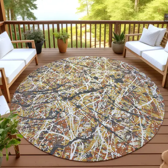 8' Gold Black And Ivory Round Abstract Washable Indoor Outdoor Area Rug Photo 4