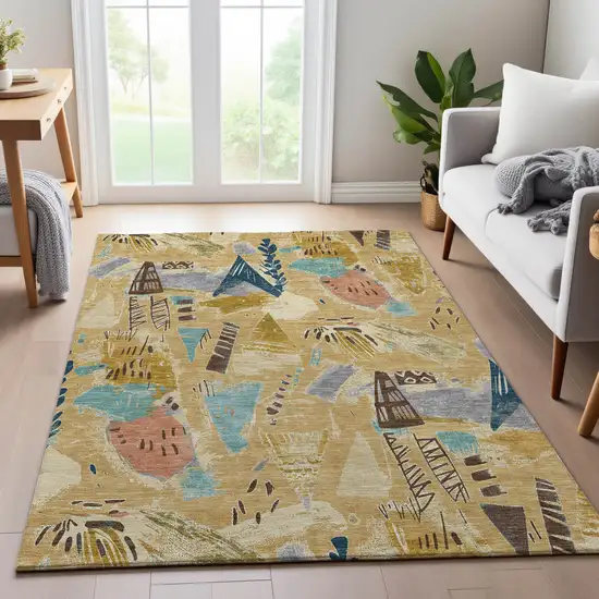 8' Gold Blue And Ivory Geometric Washable Area Rug With UV Protection Photo 5