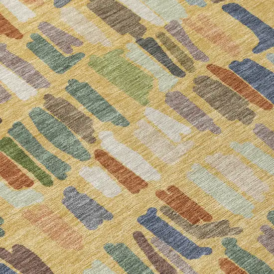 8' Gold Blue And Ivory Round Striped Washable Indoor Outdoor Area Rug Photo 9