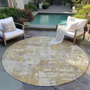 Photo of 8' Gold Brown And Beige Round Abstract Washable Indoor Outdoor Area Rug