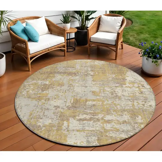 8' Gold Brown And Beige Round Abstract Washable Indoor Outdoor Area Rug Photo 1