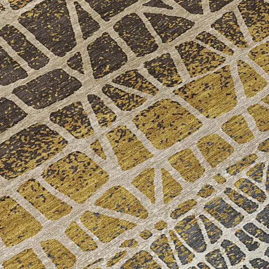 8' Gold Brown And Beige Round Geometric Washable Indoor Outdoor Area Rug Photo 9