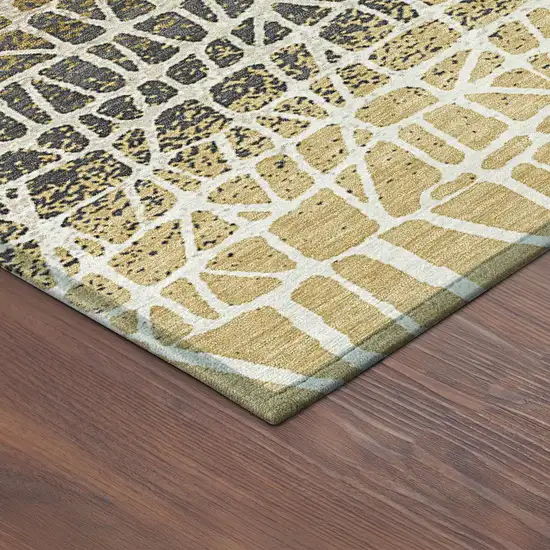 8' Gold Brown And Beige Round Geometric Washable Indoor Outdoor Area Rug Photo 8