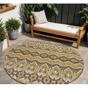 Photo of 8' Gold Brown And Beige Round Moroccan Washable Indoor Outdoor Area Rug