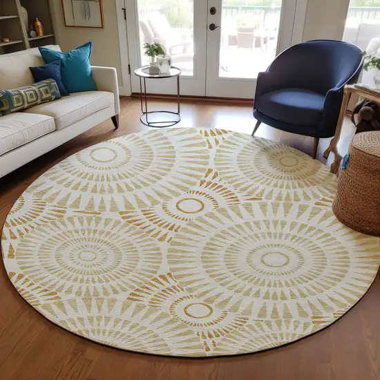 8' Gold Brown And Ivory Round Geometric Washable Indoor Outdoor Area Rug Photo 7