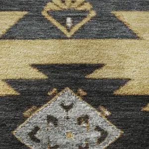 Photo of 8' Gold Charcoal And Gray Tribal Washable Round Rug With UV Protection