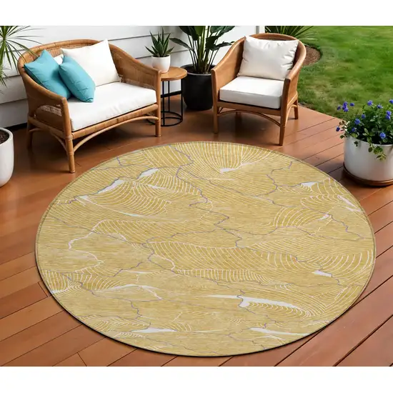 8' Gold Charcoal And Ivory Round Abstract Washable Indoor Outdoor Area Rug Photo 1