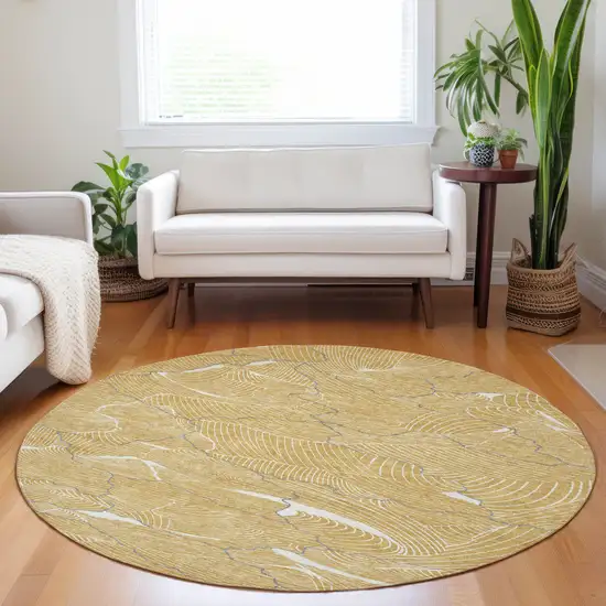 8' Gold Charcoal And Ivory Round Abstract Washable Indoor Outdoor Area Rug Photo 8
