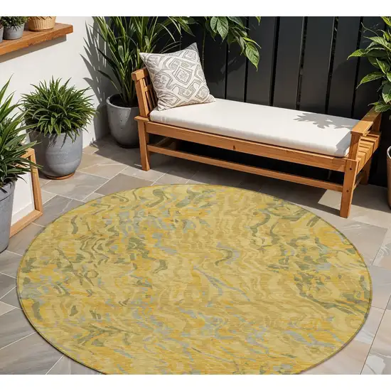 8' Gold Gray And Beige Round Abstract Washable Indoor Outdoor Area Rug Photo 1