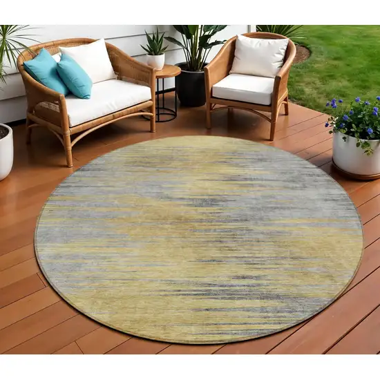 8' Gold Gray And Charcoal Round Abstract Washable Indoor Outdoor Area Rug Photo 1