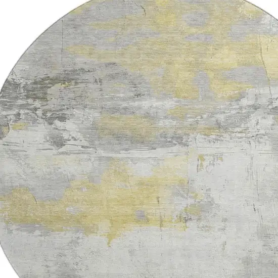 8' Gold Gray And Ivory Abstract Washable Round Rug With UV Protection Photo 2