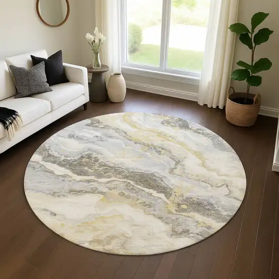 8' Gold Gray And Ivory Abstract Washable Round Rug With UV Protection Photo 4