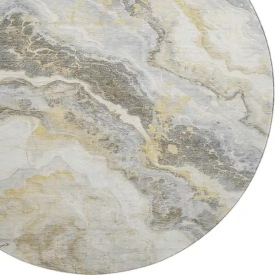 8' Gold Gray And Ivory Abstract Washable Round Rug With UV Protection Photo 2