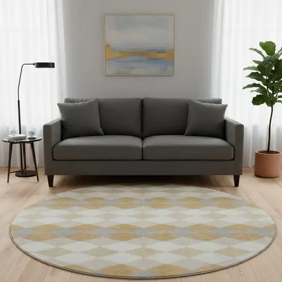 8' Gold Gray And Ivory Geometric Washable Round Rug With UV Protection Photo 2