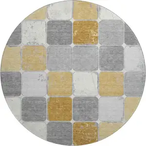 Photo of 8' Gold Gray And Ivory Geometric Washable Round Rug With UV Protection