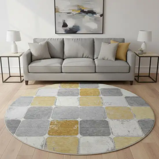 8' Gold Gray And Ivory Geometric Washable Round Rug With UV Protection Photo 2