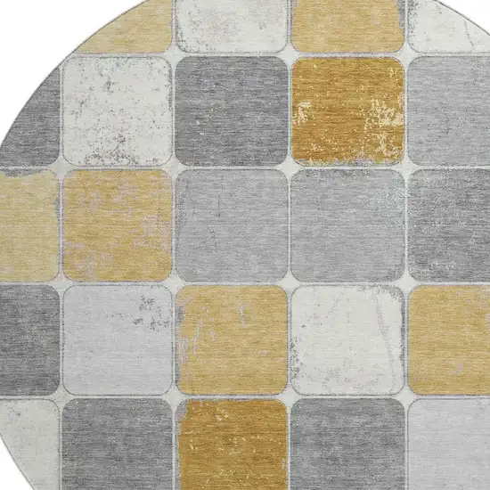 8' Gold Gray And Ivory Geometric Washable Round Rug With UV Protection Photo 3