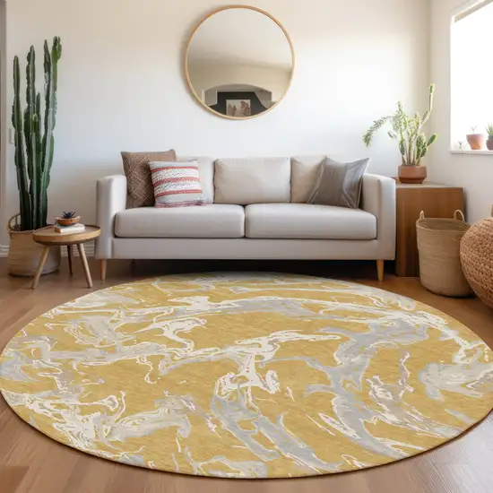 8' Gold Gray And Ivory Round Abstract Washable Indoor Outdoor Area Rug Photo 8