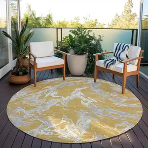 Photo of 8' Gold Gray And Ivory Round Abstract Washable Indoor Outdoor Area Rug