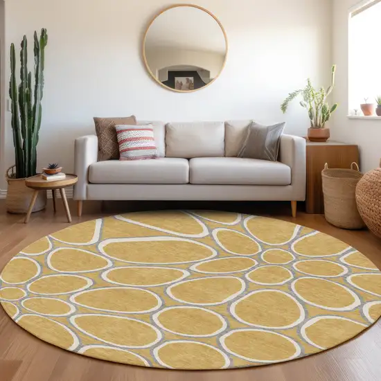 8' Gold Gray And Ivory Round Abstract Washable Indoor Outdoor Area Rug Photo 8