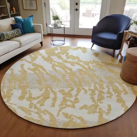 8' Gold Gray And Ivory Round Animal Print Washable Indoor Outdoor Area Rug Photo 5