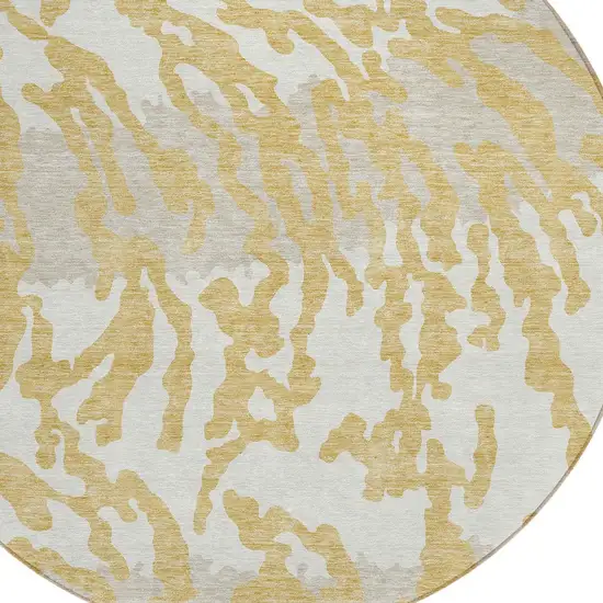 8' Gold Gray And Ivory Round Animal Print Washable Indoor Outdoor Area Rug Photo 2