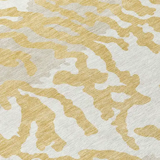 8' Gold Gray And Ivory Round Animal Print Washable Indoor Outdoor Area Rug Photo 7