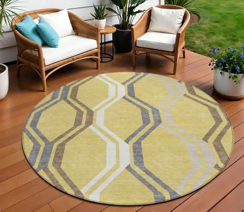 8' Gold Gray And Ivory Round Geometric Washable Indoor Outdoor Area Rug Photo 1