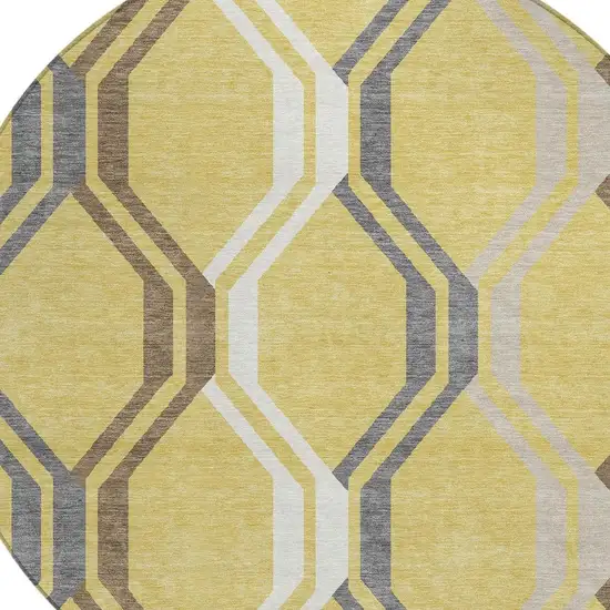 8' Gold Gray And Ivory Round Geometric Washable Indoor Outdoor Area Rug Photo 6