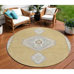 Photo of 8' Gold Gray And Ivory Round Oriental Washable Indoor Outdoor Area Rug