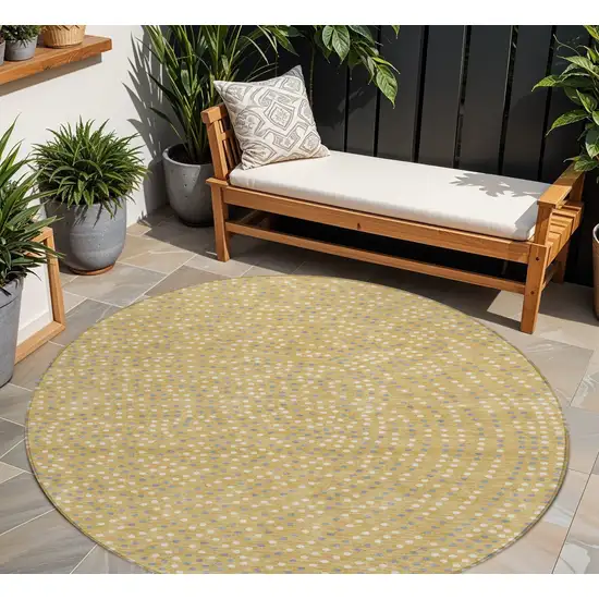 8' Gold Gray And Ivory Round Polka Dot Washable Indoor Outdoor Area Rug Photo 1